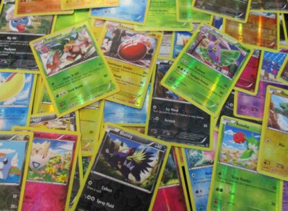 Lot of 20 Reverse Holo Common/Uncommon Played Pokemon Cards
