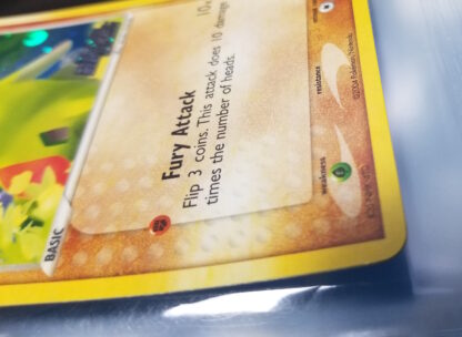 Larvitar 62/109 Team Rocket Returns *Minor Yellow Ink Stain* (Reverse Holo) (NM Condition) - Image 2